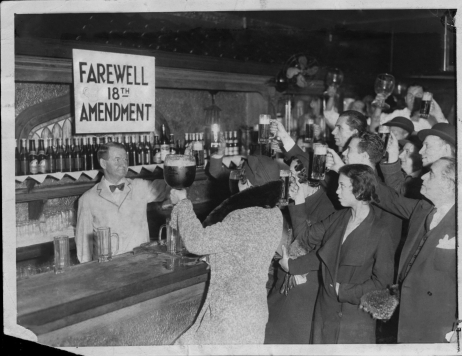 FILE PHOTO 1932 -- Speakeasy ( speak-easy ) patrons offer a farewell toast to Prohibition which took effect in December 1933.